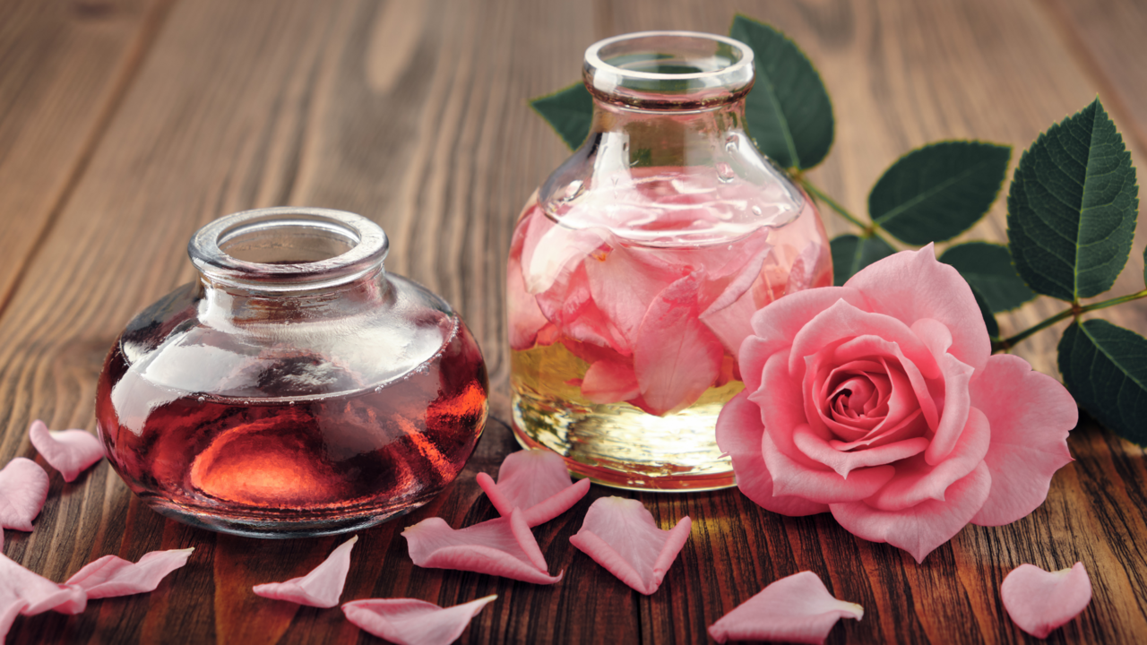 Rose Essential Oil with rose petals